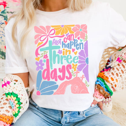 A Lot Can Happen In 3 Days  | Easter Graphic Tee | Gildan: Graphite Heather / Small